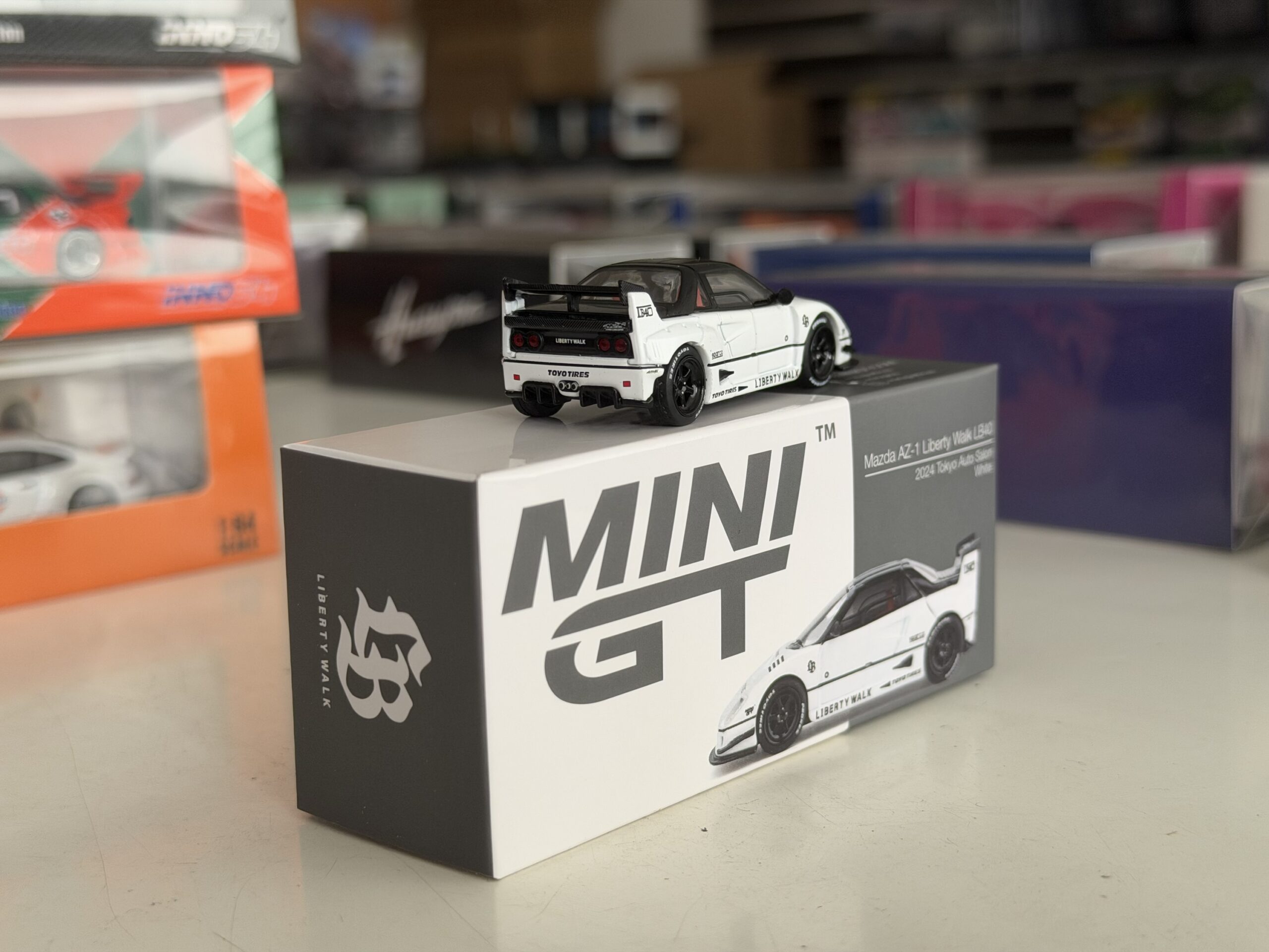 Mini GT 1:64 Mazda AZ-1 Liberty Walk LB40 – White – 2024 Tokyo