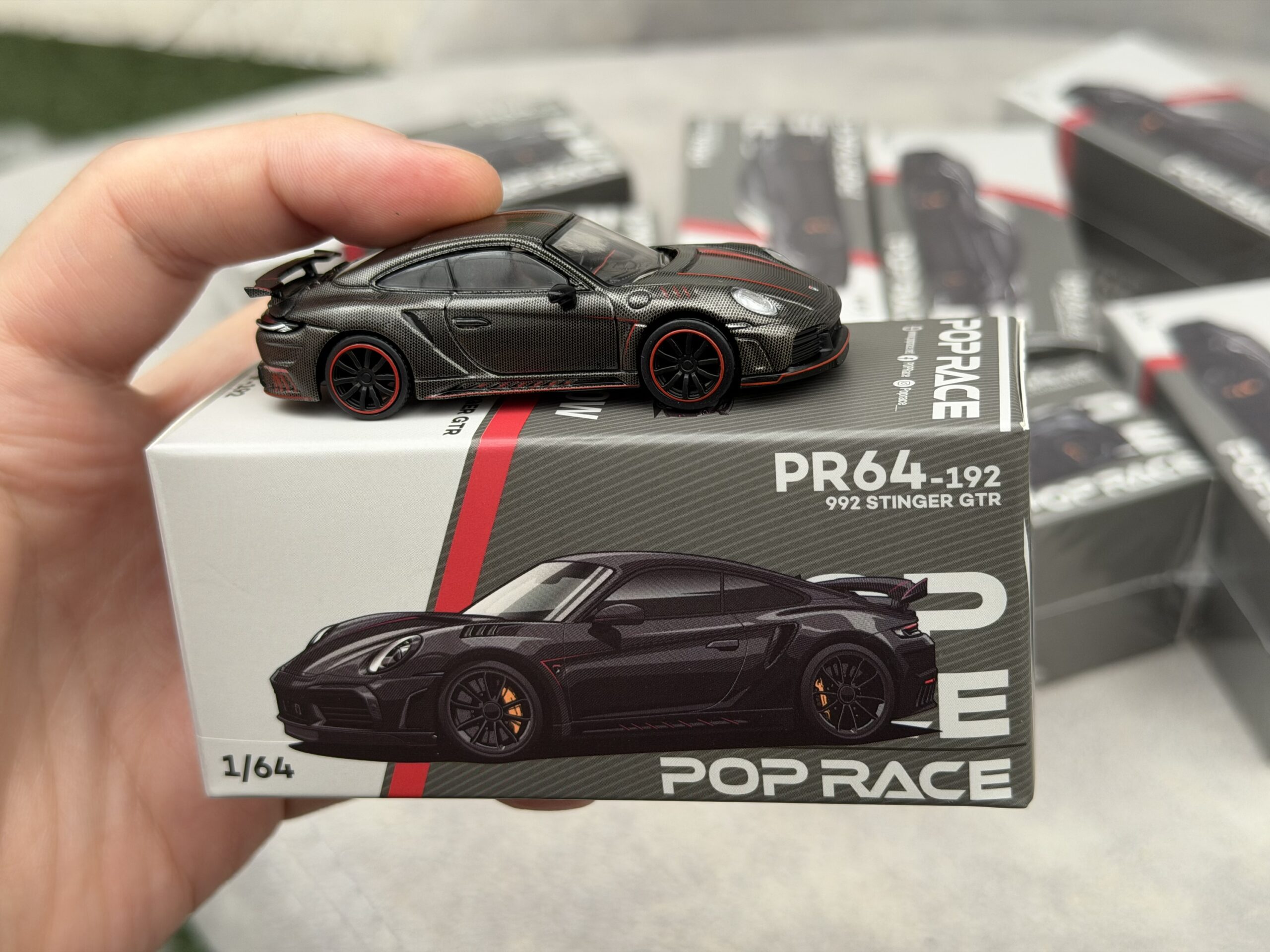 Pop Race 1/:64 Porsche 992 STINGER GTR CARBON EDITION - REDLINE