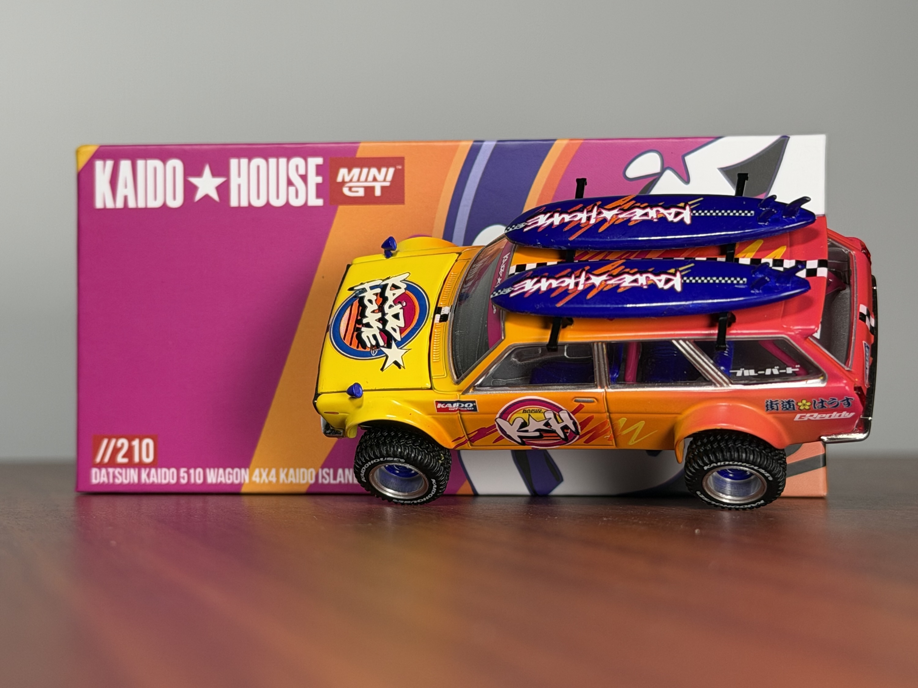 Kaido House x Mini GT 1:64 Datsun KAIDO 510 Wagon 4×4 Kaido ISLANDS V1- Orange