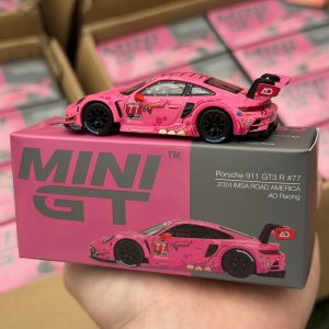 Mini GT 1:64 Porsche 911 GT3 R #77 AO Racing  2024 IMSA ROAD AMERICA Roxy en empaque de CAJA